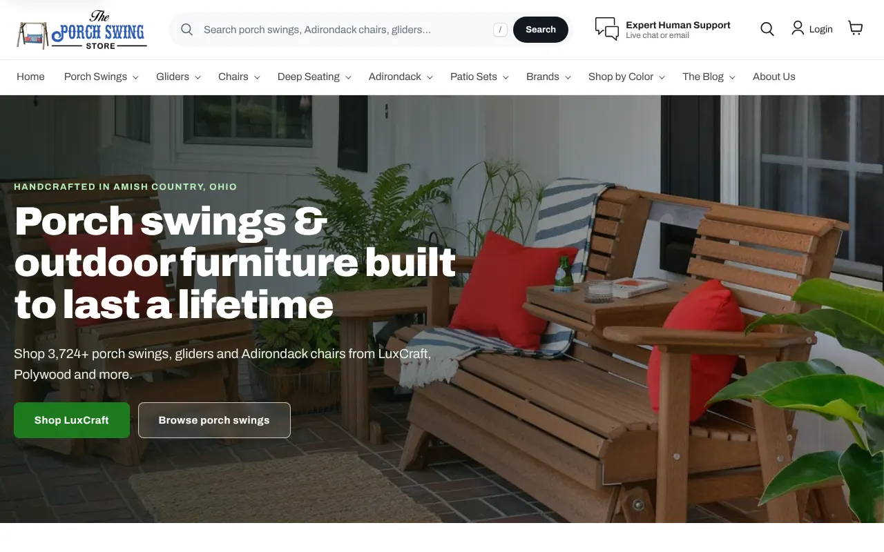 The Porch Swing Store home page on a desktop screen, with a porch hero photo, a search bar and a menu of product types